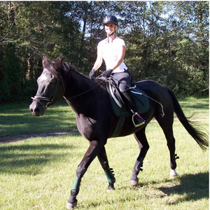 Pictured is Amy Hart riding a black horse.