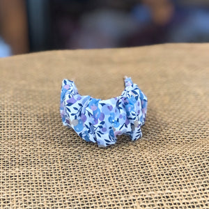 Pictured is Liberty London Apple Watch Band in the pattern Wiltshire Blue sold at The Hare & The Hart in downtown Thomasville, Georgia. It is an Apple watch in the size 40mm made from blue, purple, and white floral fabric.