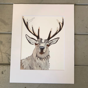 Pictured is a print designed by artist Maddie Hart and sold at The Hare & The Hart in downtown Thomasville, Georgia. It is an 8"x 10", matted to 11" x 14", print of a watercolor deer,