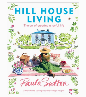 Pictured is the book "Hill House Living: The Art of Creating a Joyful Life" by Paula Sutton published by Penguin Random House and sold at The Hare & The Hart in downtown Thomasville, Georgia.