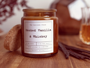 Pictured is a Smoked Vanilla & Whiskey Soy Candle by The Lemonade Stand and sold at The Hare & The Hart in downtown Thomasville, Georgia.