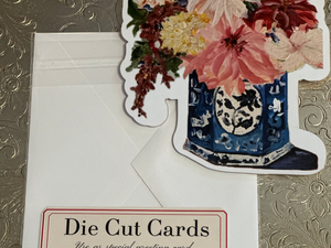 Pictured is a Carpe Diem Papers "Delft Floral" Fancy Die Cut Card sold at The Hare & The Hart in downtown Thomasville, Georgia.