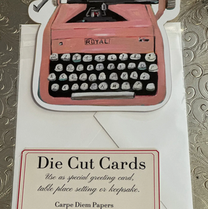 Pictured is a Carpe Diem Papers "Pink Typewriter" Fancy Die Cut Card sold at The Hare & The Hart in downtown Thomasville, Georgia.