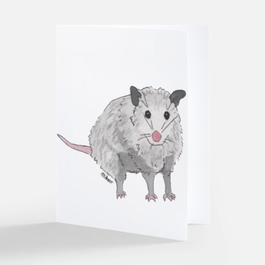 Pictured is a possum notecard designed by artist Maddie Hart sold at The Hare & The Hart in downtown Thomasville, Georgia.