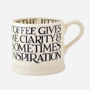 Pictured is a Clarity & Inspiration Mug by Emma Bridgewater sold at The Hare & The Hart in downtown Thomasville, Georgia. It is a ceramic mug that reads, "COFFEE GIVES ME CLARITY & SOMETIMES INSPIRATION"