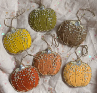 Pictured are six Handmade Irish Linen Pumpkin Ornaments sold at The Hare & The Hart in downtown Thomasville, Georgia.