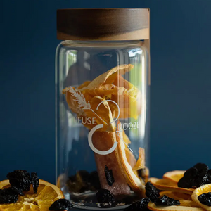Pictured is Old Fashioned by Infuse & Booze sold at The Hare & The Hart in downtown Thomasville, Georgia. It is a glass jar with a wooden lid filled with cocktail ingredients.