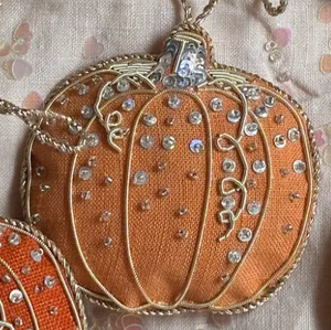 Open image in slideshow, Pictured is a Handmade Irish Linen Pumpkin Ornament sold at The Hare &amp; The Hart in downtown Thomasville, Georgia. It is a light orange pumpkin ornament.
