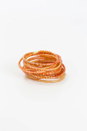 Pictured are Beach Bangles in Sunny Orange sold at The Hare & The Hart in downtown Thomasville, Georgia.