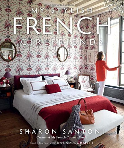 Pictured is the book "My Stylish French Girlfriends" by Sharon Santoni. The cover freatures a photograph by Franck Schmitt of a French bedroom with a woman standing by the window.