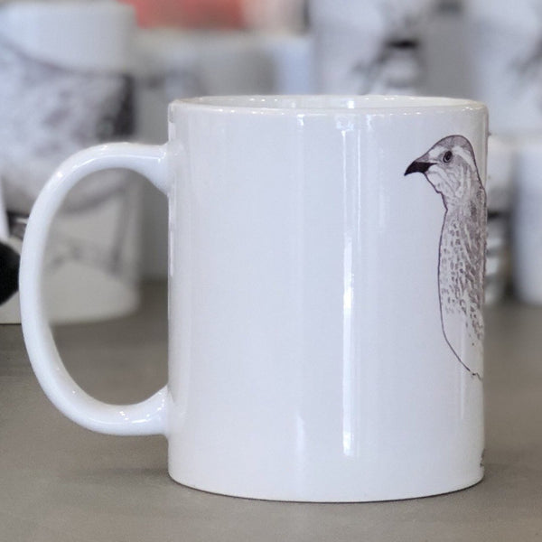 A small white mug with a quail design pictured from the side. This is a Small Mug by Birds & Bees sold at The Hare & The Hart.