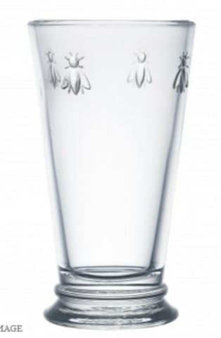 A clear glass highball with four bees embossed on opposite sides. There is a Bee Highball Glass by La Rochere sold at The Hare & The Hart.