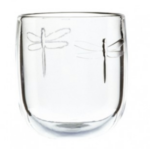 A short tumbler glass with two dragonfly designs embossed on it. This is a Dragonfly Tumbler by La Rochere and sold at The Hare & The Hart.
