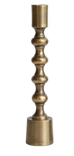 Pictured is a Antique Gold Finish Taper Holder in 9.5 Inch size and sold at The Hare & The Hart in downtown Thomasville, Georgia.