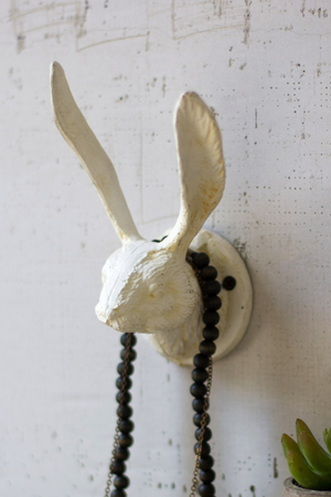 Pictured is a Cast Iron Rabbit Wall Hook - White sold at The Hare & The Hart in downtown Thomasville, Georgia.